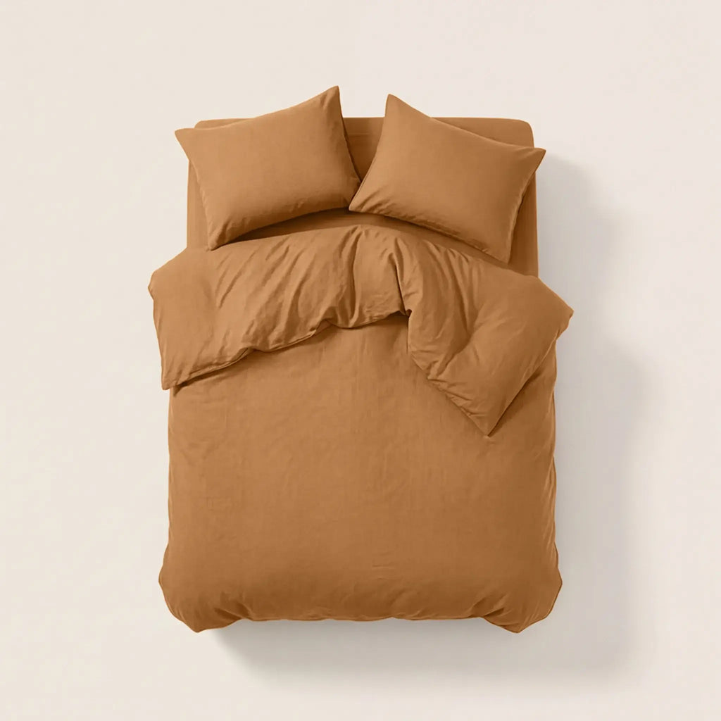 Sateen Bedding Set - Desert Sand on a bed, featuring a modern beige color for a stylish and intentional look.