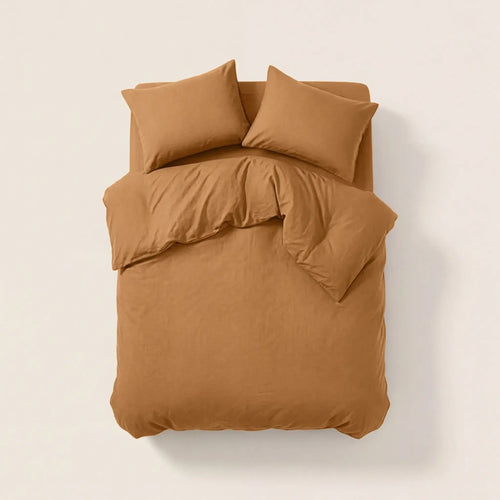 Sateen Bedding Set - Desert Sand on a bed, featuring a modern beige color for a stylish and intentional look.