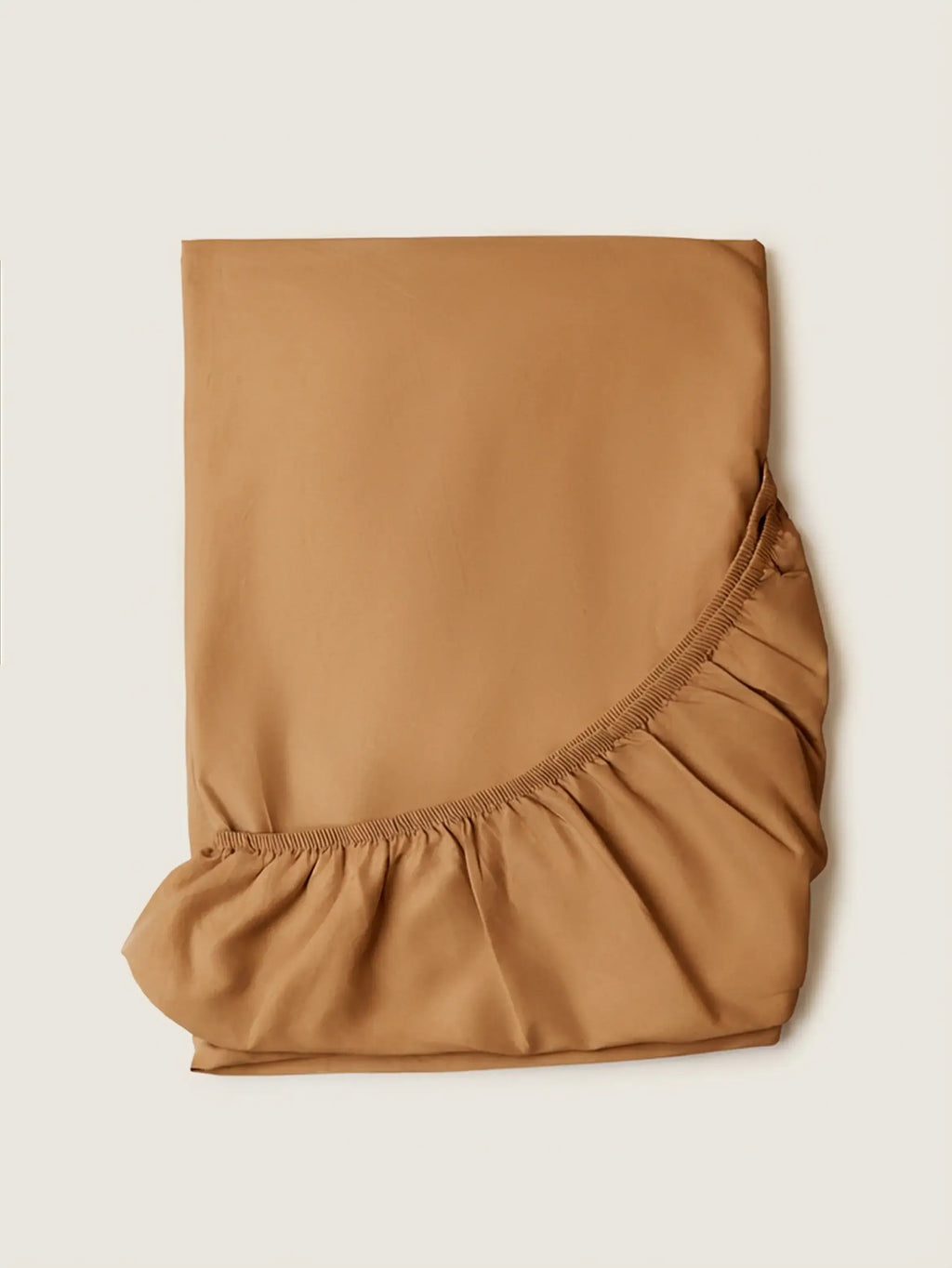 Sateen Bedding Set - Desert Sand in a warm beige color with elegant ruffled detailing.